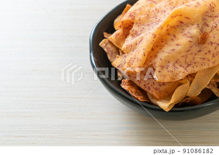 Taro Chips - fried or baked sliced taro 91086182