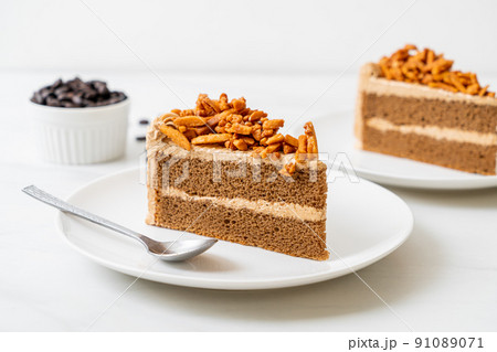 coffee almonds cake on plate 91089071