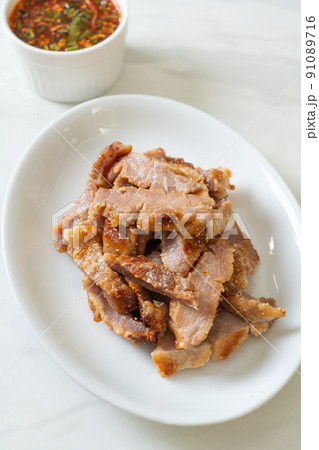 Grilled Pork Neck with Thai Spicy Sauce Grilled Pork Neck with Thai Spicy Sauce 91089716