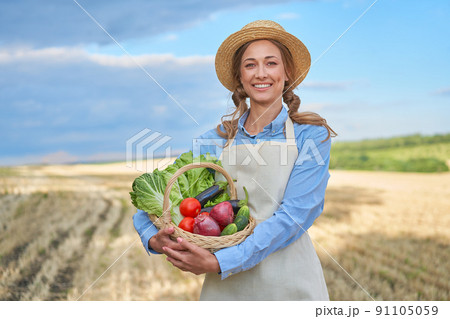 Woman farmer straw hat smart farming  91105059