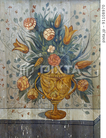 Flowers, painting at the church altar 91108970