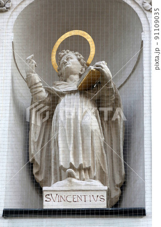 Saint Vincent on the facade of Dominican Church in Vienna, Austria Saint Vincent on the facade of Dominican Church in Vienna, Austria 91109035