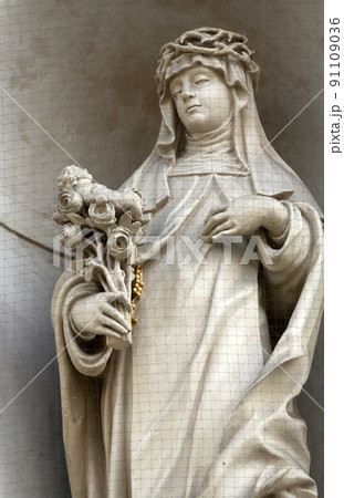 Saint Rose of Lima on the facade of Dominican Church in Vienna, Austria Saint Rose of Lima on the facade of Dominican Church in Vienna, Austria 91109036