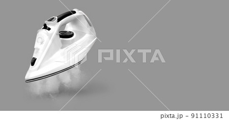 modern iron on grey background modern iron on grey background 91110331