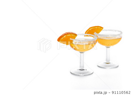 Classic sidecar cocktail with a sugar rim isolated on white background 91110562