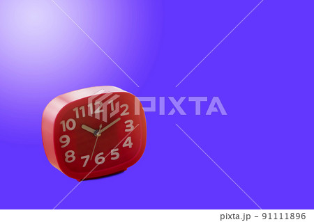 Red alarm clock isolated on blue background. Red alarm clock isolated on blue background. 91111896
