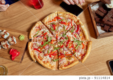 Image of teenage friends hands taking slices of pizza. Image of teenage friends hands taking slices of pizza. 91114814