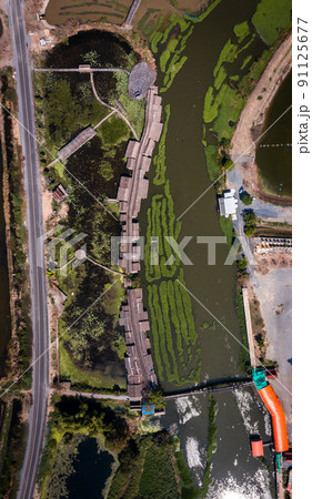 Aerial view of Sapan Khong Floating Market in Suphan Buri, Thailand 91125677