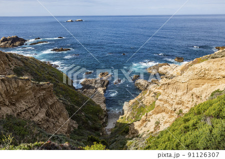 USA, California, Big Sur, Ocean waves crashing against Big Sur coast USA, California, Big Sur, Ocean waves crashing against Big Sur coast 91126307