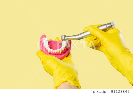 Dental instruments for teeth dental care on blue background 91128345
