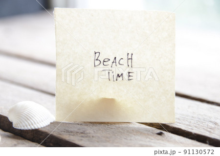 Sign with the inscription beach time. Summer travel idea. 91130572