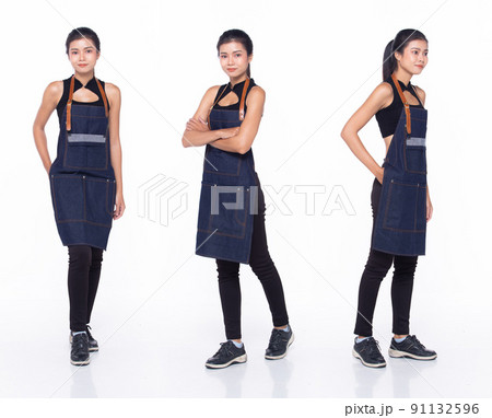 Full length 30s Asian Woman barista waitress menu, working hard thinking Full length 30s Asian Woman barista waitress menu, working hard thinking 91132596