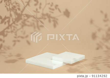 scene with square podium on beige background and shadows 91134292