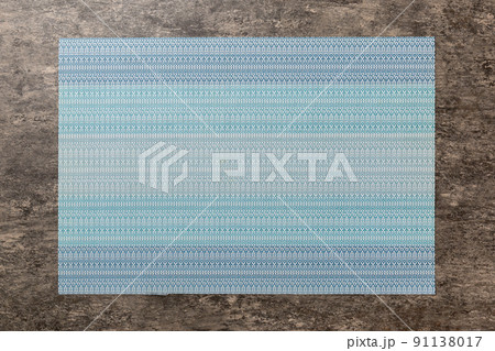 Top view of blue tablecloth for food on cement background. Empty space for your design Top view of blue tablecloth for food on cement background. Empty space for your design 91138017