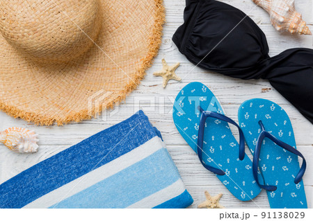 Summer vacation concept flat lay. beach accessories and towel top view. Space for text. travel concept 91138029