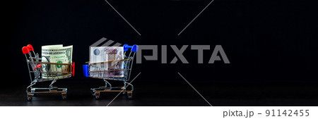 shopping cart with money shopping cart with money 91142455