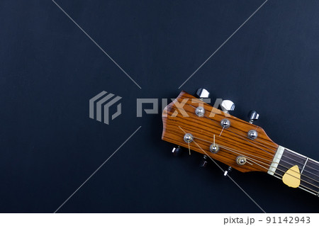 guitar and pick 91142943