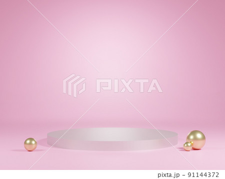 Simple metallic cylinder podium with golden balls on feminine pink background  91144372