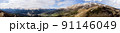 Panoramic landscape view, snow covered mountain peaks on mountain range. 91146049