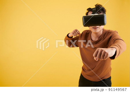 Man Fighting with Enemy in Game Man Fighting with Enemy in Game 91149567