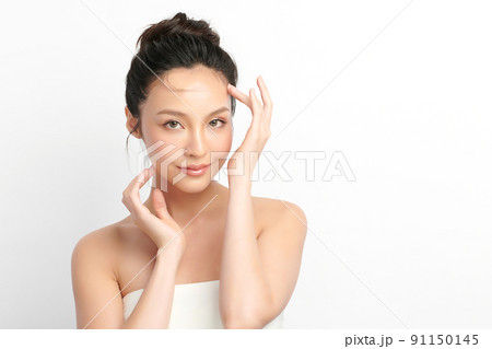Beautiful young asian woman with clean fresh skin on white background, Face care, Facial treatment, Cosmetology, beauty and spa, Asian women portrait. Beautiful young asian woman with clean fresh skin on white background, Face care, Facial treatment, Cosmetology, beauty and spa, Asian women portrait. 91150145