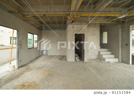 Empty under construction room in home or house with space on site. Interior. Old unfurnished room rental property, living space units. lifestyle. Renovation. Empty under construction room in home or house with space on site. Interior. Old unfurnished room rental property, living space units. lifestyle. Renovation. 91151584