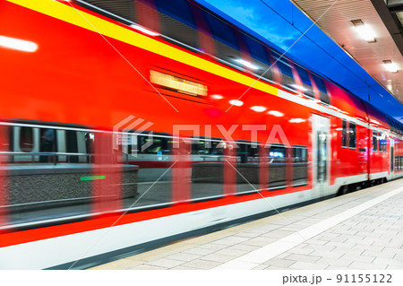 High speed train at railway station platform High speed train at railway station platform 91155122