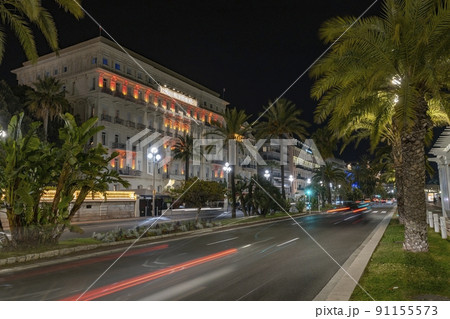 NICE FRANCE: Palatial hotel at night. Picture taken on the Promenade des Anglais in Nice France 91155573