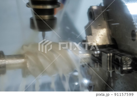 Turning milling machine with cooling system cutting metal workpiece at factory 91157599