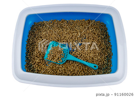 Cat's litter box with filler and scoop isolated on white background Cat's litter box with filler and scoop isolated on white background 91160026