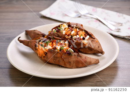 Baked stuffed sweet potato Baked stuffed sweet potato 91162250