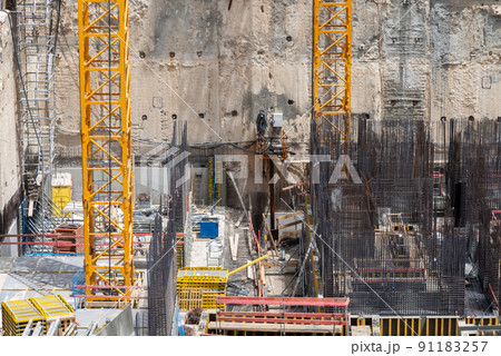 Construction site background. Hoisting cranes and new multi storey buildings. Industrial background. Close Up of Somail complex in Tel Aviv Construction work on the new Tel Aviv Municipality building 91183257