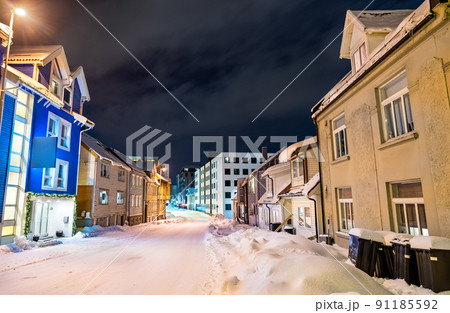 Traditional houses in Tromso at a winter night in Polar Norway 91185592