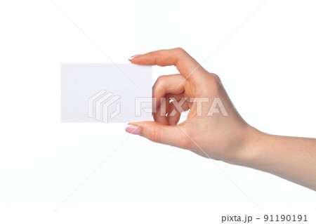 Female hand with blank white business card isolated on white Female hand with blank white business card isolated on white 91190191