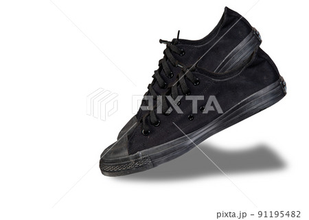 black sneakers isolated from the background. black sneakers isolated from the background. 91195482