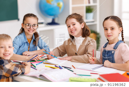 Diligent girl speaking with classmates Diligent girl speaking with classmates 91196362