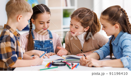 Diligent girl speaking with classmates Diligent girl speaking with classmates 91196410