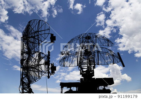 Air defense radars of military mobile anti aircraft systems, modern army industry on background beautiful clouds and sky, Russia Air defense radars of military mobile anti aircraft systems, modern army industry on background beautiful clouds and sky, Russia 91199179