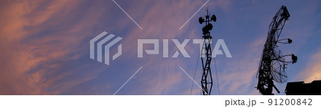 Air defense radars of military mobile anti aircraft systems, modern army industry on the background of the sunset orange sky, Russia Air defense radars of military mobile anti aircraft systems, modern army industry on the background of the sunset orange sky, Russia 91200842