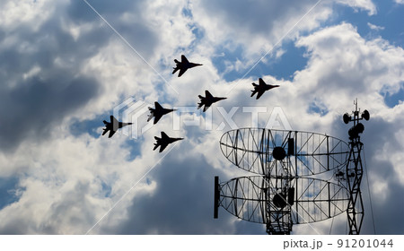 Air defense raiders of military mobile anti-aircraft complexes (radar is designed and automatic tracking of targets and missiles) against the background of the flight of modern combat fighters,Russia Air defense raiders of military mobile anti-aircraft complexes (radar is designed and automatic tracking of targets and missiles) against the background of the flight of modern combat fighters,Russia 91201044