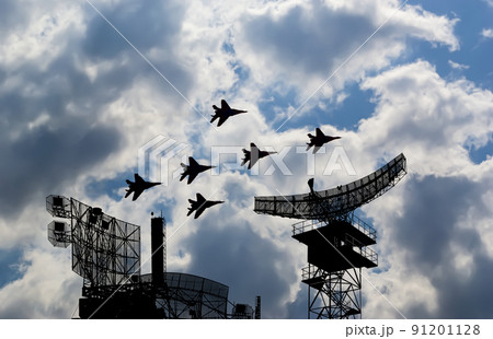 Air defense raiders of military mobile anti-aircraft complexes (radar is designed  and automatic tracking of targets and missiles) against the background of the flight of modern combat fighters,Russia 91201128