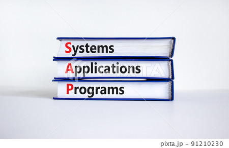 SAP, systems, applications, products symbol. Books with words SAP, systems, applications, products. Beautiful white background, copy space. Business and SAP, systems, applications, products concept. 91210230