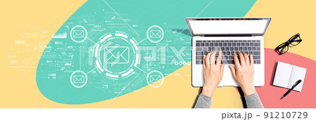 Email concept with person using a laptop Email concept with person using a laptop 91210729