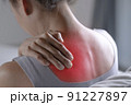 Asian woman has shoulder pain 91227897