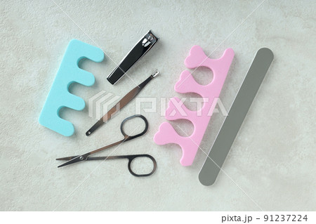 Concept of nail care with manicure accessories on light textured background 91237224