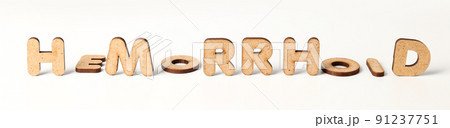 Concept of hemorrhoids with wooden letters on white background 91237751