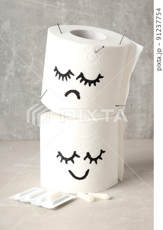 Concept of healthcare with hemorrhoids accessories on light textured table 91237754