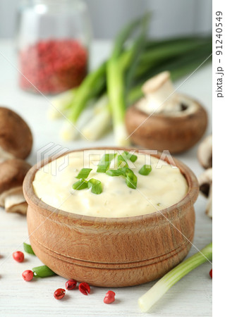 Concept of tasty food with mushroom sauce on white wooden background Concept of tasty food with mushroom sauce on white wooden background 91240549