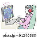 パソコンでゲームをする、ヘッドフォンを付けた若い女性 パソコンでゲームをする、ヘッドフォンを付けた若い女性 91240685
