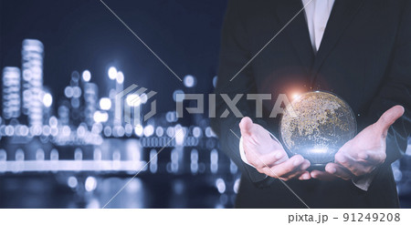 Businessman holding in hand with global connection concept. Businessman holding in hands with global connection concept. Energy saving concept. 91249208